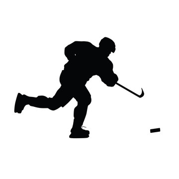 Ice hockey player vector silhouette. Hockey player shoots the pu