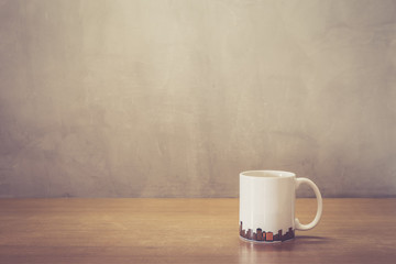 Close up white coffee cup on wooden table