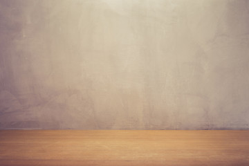 Grey wall and top wooden table or counter. For product display