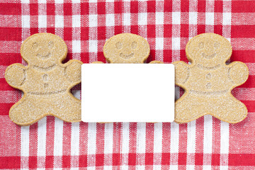 close-up image of empty placard and gingerbread candies.