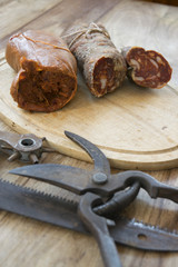 nduja and soppressata salami with old working tools
