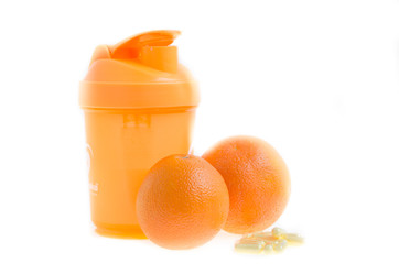 orange , shaker, vitamins on white background. Prepare for summer.