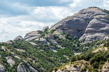 Conglomerate rocks in Montserrat mountains near Maria de Montserrat Abbey, Spain