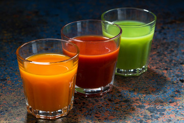 vegetable juices in glass beakers