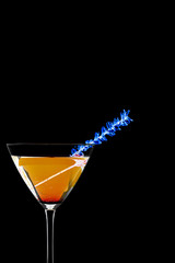 martini drink with blue streamer