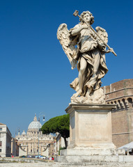 Fototapeta na wymiar Angel statue by Bernini along Sant'Angelo bridge in Rome