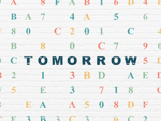 Time concept: Tomorrow on wall background