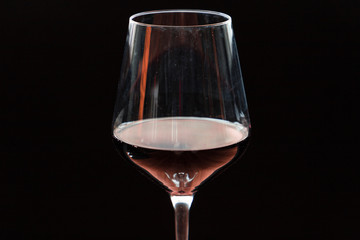 A Glass of Wine on a Black Background