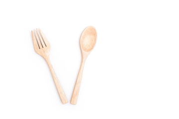 Close up wooden spoon and fork isolated on white background