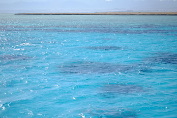 Shining blue sea water ripple background