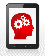 Information concept: Tablet Pc Computer with Head With Gears on display