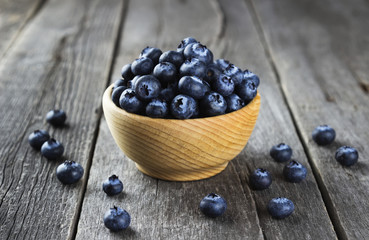 Blueberry on a dark wooden background