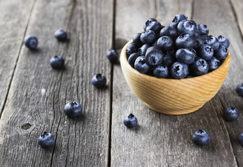 Blueberry on a dark wooden background