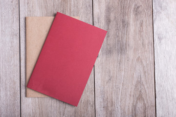 Top view of book on old wooden plank