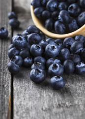 Blueberry on a dark wooden background