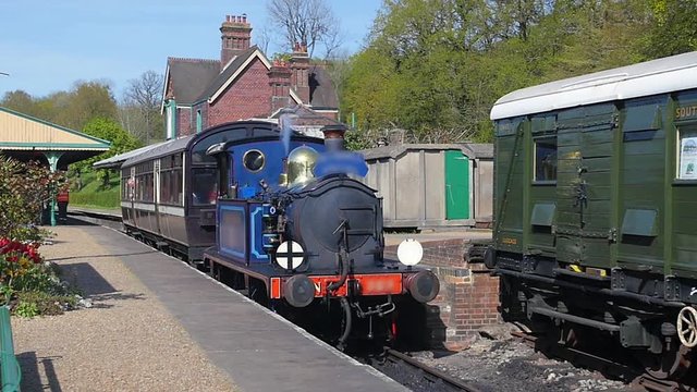 Vintage steam train leaving the station