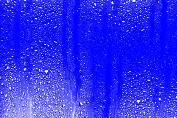 Naklejka na ściany i meble Abstract background of water drops. Texture of water.