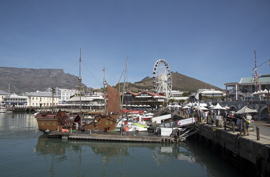 CAPE TOWN SOUTH AFRICA - APRIL 2016 - The V&A Waterfront development a working harbor and leisure location for tourists
