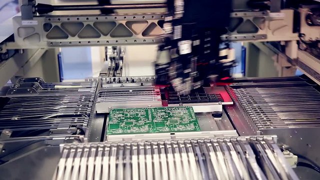 Robotic production of printed Circut Board. HD.