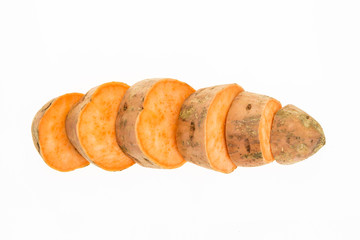 Fresh sweet potato sliced , isolated on white background