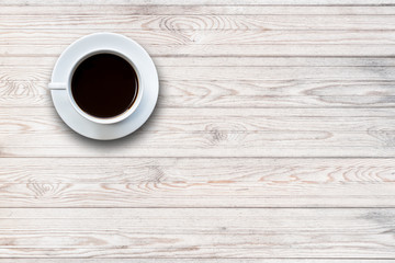 White coffee cup on wooden table top view