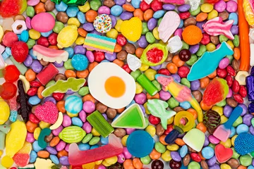 Foto op Plexiglas Snoepjes kleurrijke smakelijke snoepjes snoep achtergrond