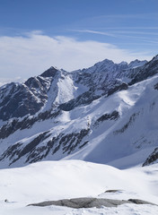 Fototapeta na wymiar Mountain top panorama from Ghiacciaio presena glacier, near town Ponte di legno, italy