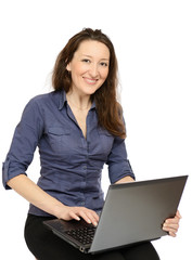 Photo of young woman at work on her laptop