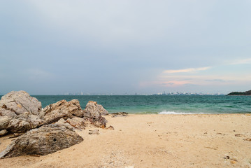 Beach with city view when the rain is coming