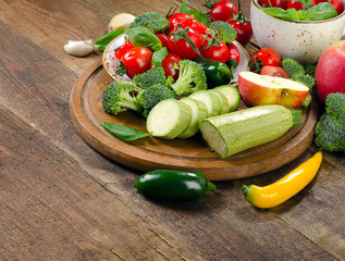 Fresh vegetables on a wooden board.