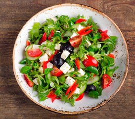 Fresh vegetable salad with feta cheese.