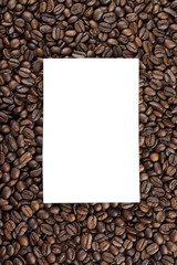 piece of paper on heap of coffee beans