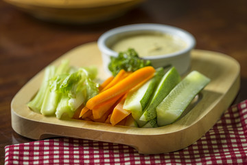 Vegetable sticks with Seafood cream dip on wood board