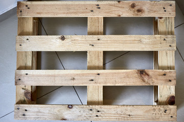 Pallet on tile floor indoors