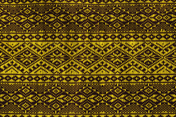 Thai fabric texture background with yellow pattern beautiful