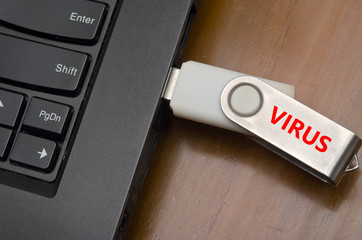 Virus USB thumb drive plug in to laptop computer port