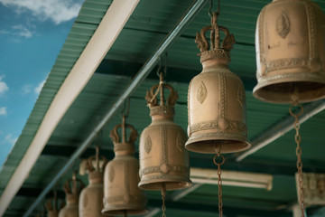 Buddhist bells / Buddhist bells hanging in temple.