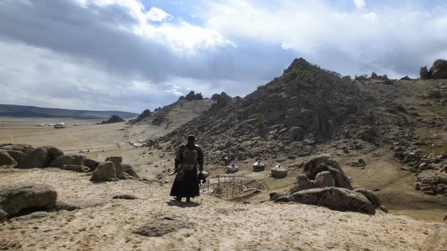 The warrior of the Middle Ages standing upon the Mount.