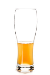 HALF GLASS of DRAFT BEER. Fresh gold cold and delicious. Beer in curvaceous glass. Good for brewery of oktoberfest commercial. White background