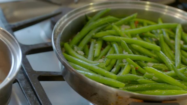 Cooking Garlic Green Beans and Sauce. Nutritious Veggie Meal.