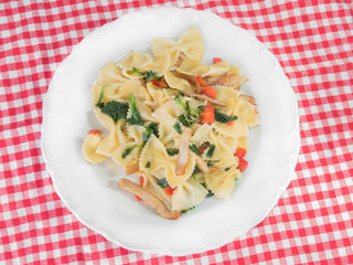 pasta with bacon in a white plate