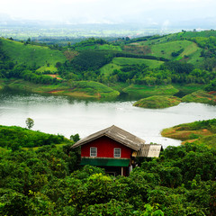 Fototapeta na wymiar red house and Lake view, Thailand. 