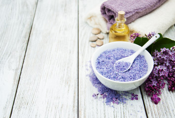Spa setting with lilac flowers