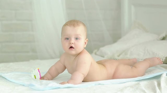 Portrait of an infant. Six-month-old boy.