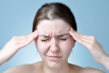 Woman suffering from headache