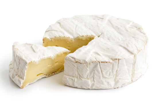 White mould cheese with cut slice isolated on white.