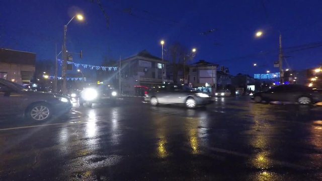 Car lights in traffic, dusk time-lapse