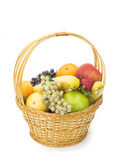 tasty summer fruits in backet isolated on white