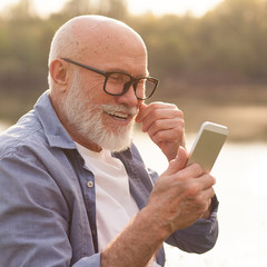 older man using a smartphone
