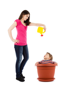 Mother Watering Baby Plant